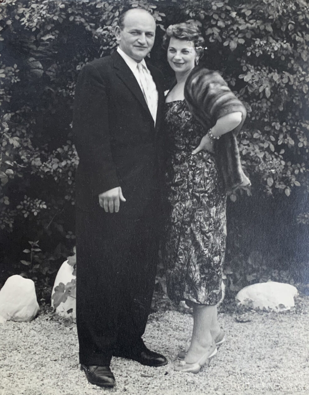 A black and white photo of a man and woman.