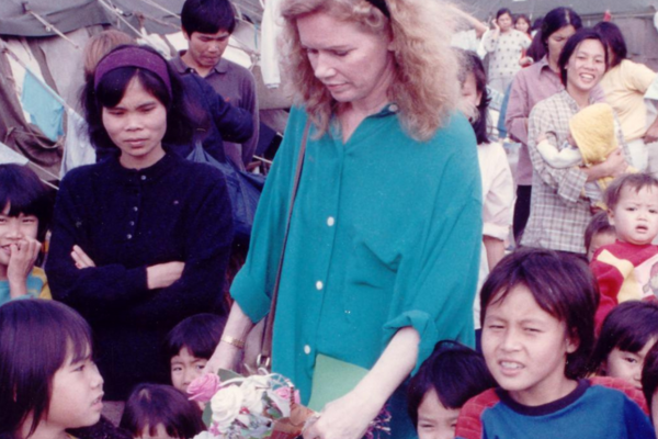 Liv Ullmann in Hong Kong with Vietnamese refugees