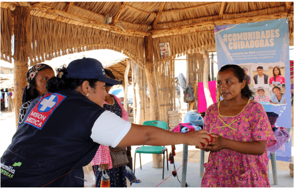 In LaGuajira, Colombia, a Profamilia community health worker and a community member.